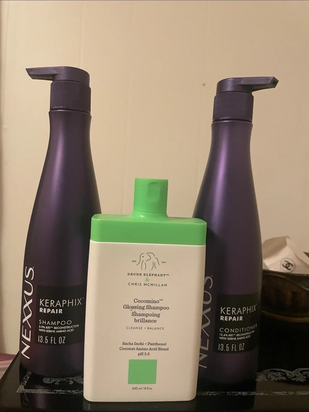 Drunk Elephant Cocomino Glossing Shampoo and Nexxus Keraphix repair